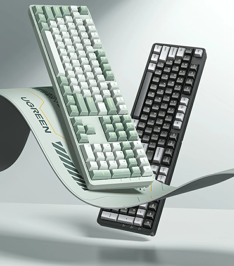 轻音红轴细节 - 40db静音设计,适合办公与夜间使用 绿联ku103键盘轻音红轴特写,4.0mm行程与45g触发压力带来顺滑低噪体验